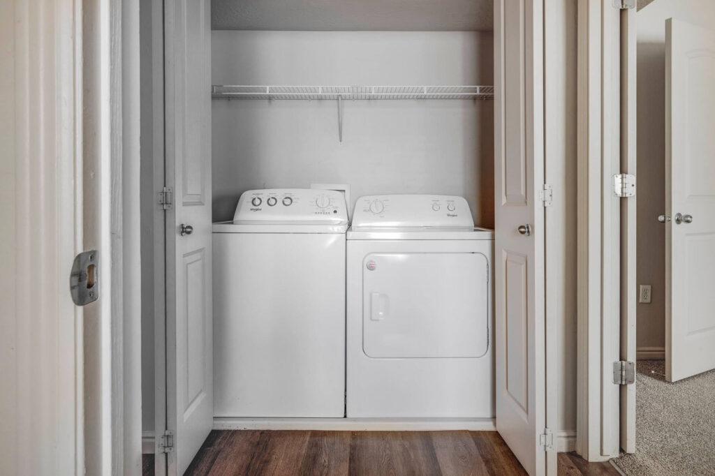 washer and dryer in a closet